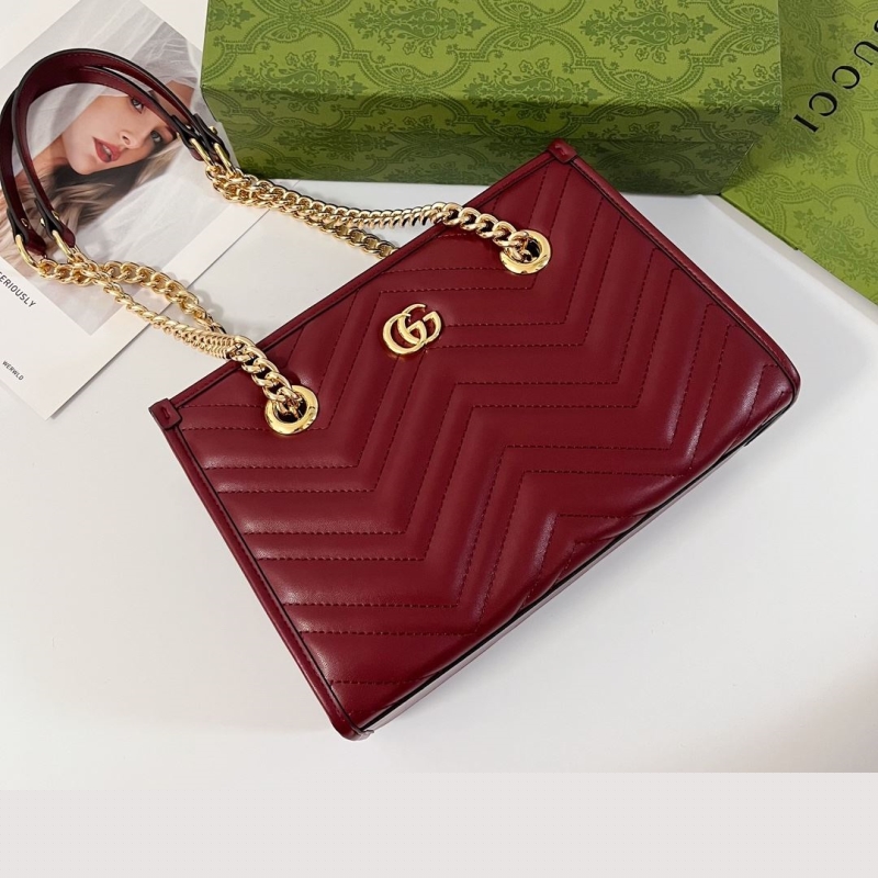 G*u*i shopping bags